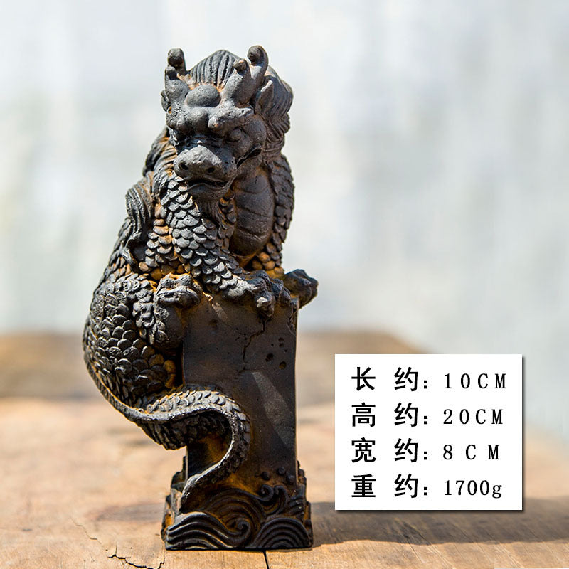 An iron-cast desktop figure in the Chinese style that depicts the water-repelling mythical beast "Gong Fu," signifying harmony and protection from water-related disasters